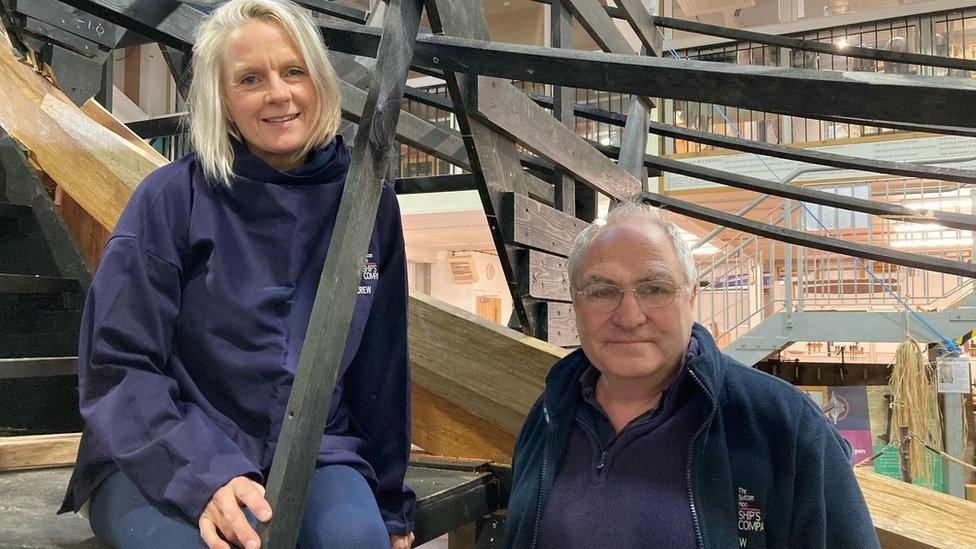 Project manager Jacq Barnard and master shipwright Tim Kirk at the shed in Woodbridge where the ship is being built