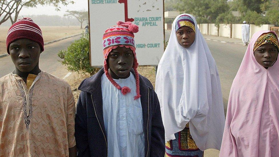 Four children affected by the Pfizer trial in Kano pictured in 2008