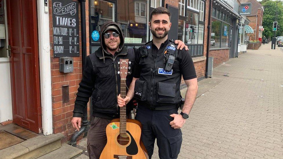 Philip with police officer