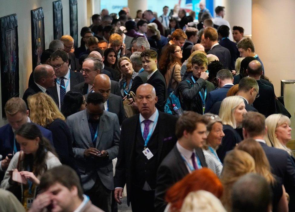 Conservative activists queue to hear Boris Johnson at the fringe event