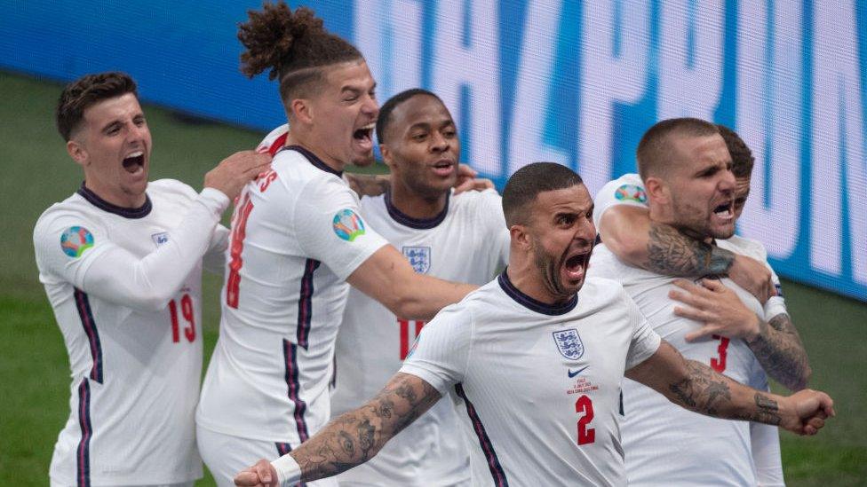 England players celebrate scoring in the Euro 2020 final,