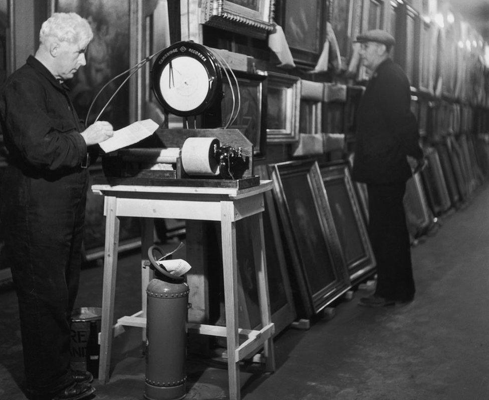 September 1942: Engineer in charge J.R. Jones takes a reading of the relative humidity in a subterranean chamber at Manod Quarry, north Wales,