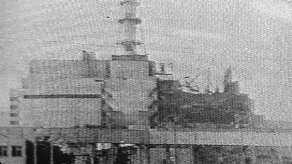 An image from Soviet television showing, on 20 April 1986, this picture of the Chernobyl plant on which a half-destroyed building could be seen