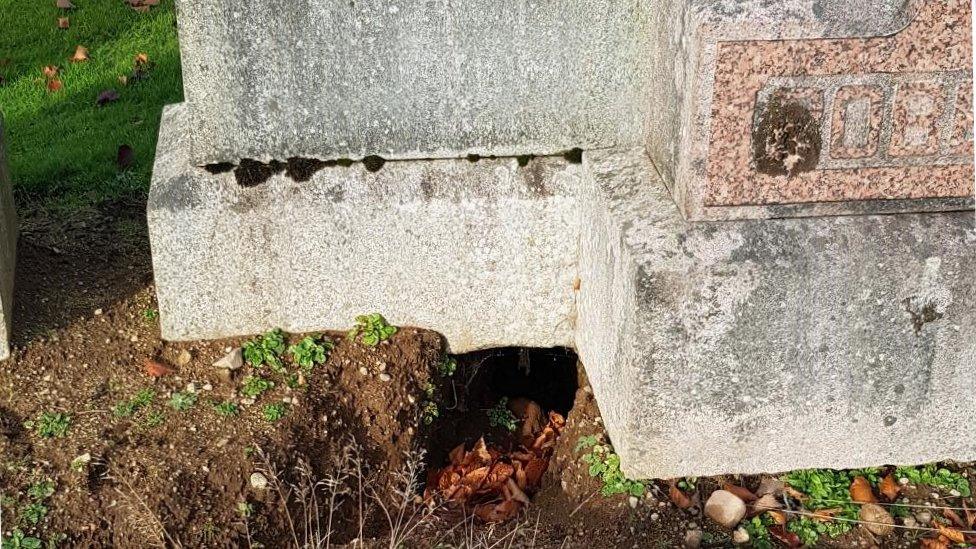 damage to headstone