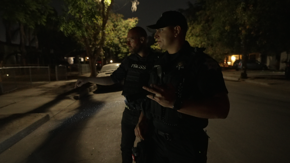 Officer Nate Palomino looking for gun casings