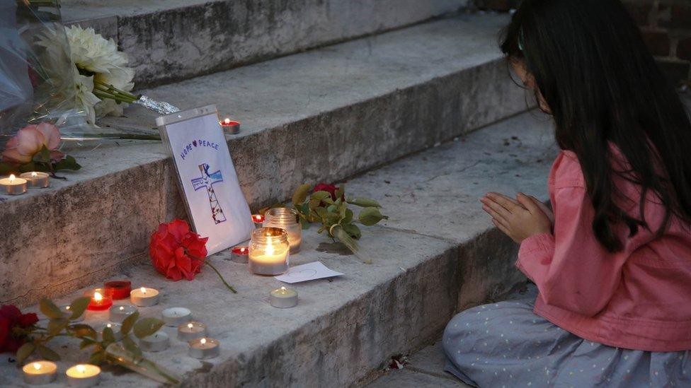 Flowers and tributes in Saint-Etienne-du-Rouvray after a priest was killed with a knife