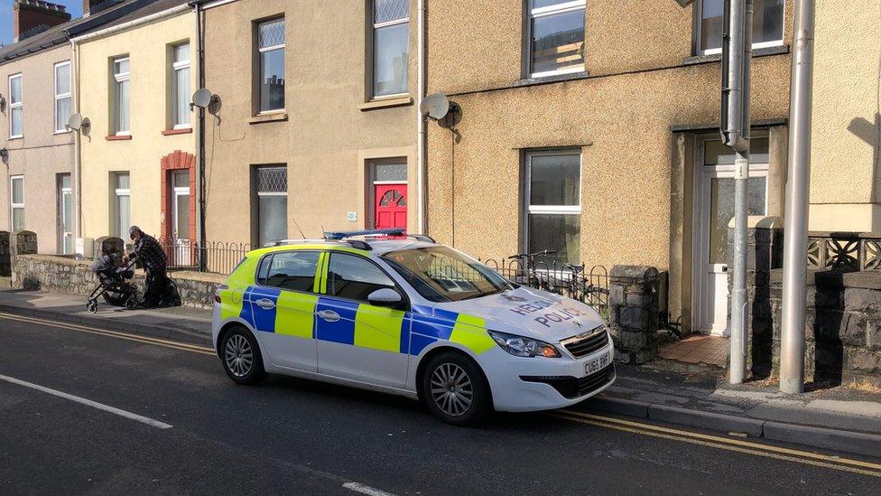 Police car outside 32 Francis Terrace