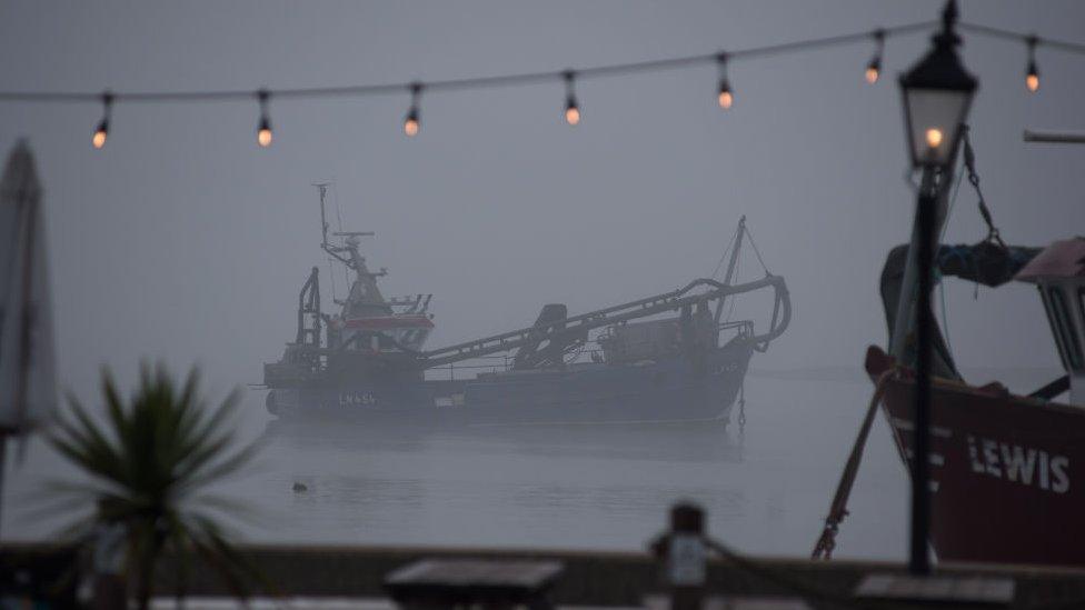 A trawler in dense fog in Leigh-on-Sea, Essex