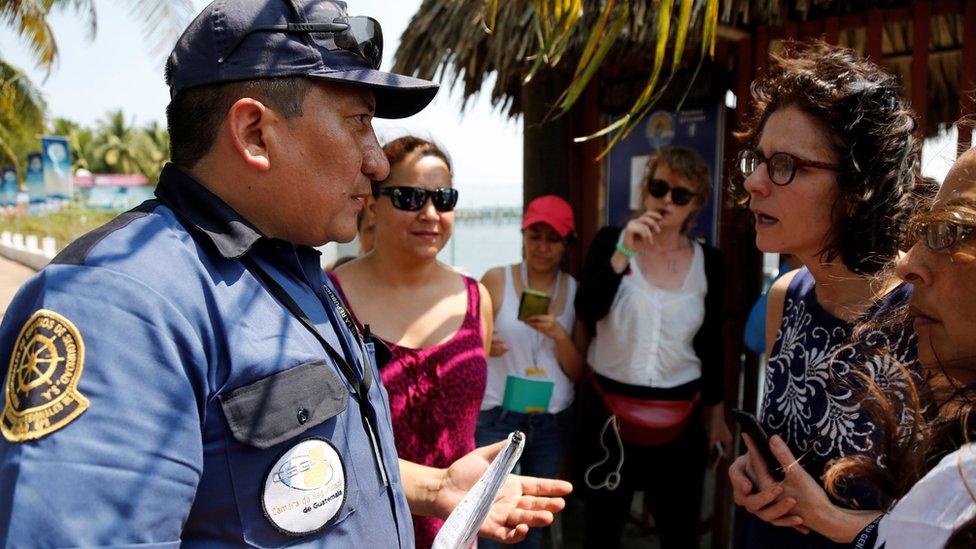 A guard faces members of Women on Waves, 24 Feb 2017, Guatemala