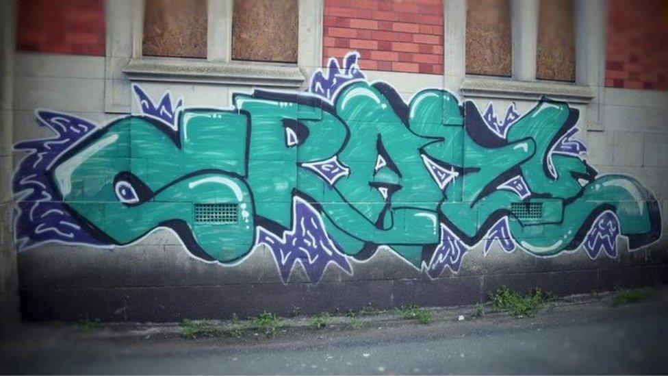 Graffiti reading "crazy"