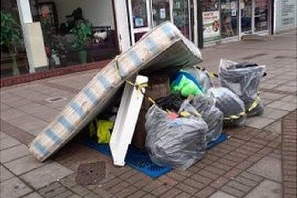 Pile of rubbish on street in Harrow