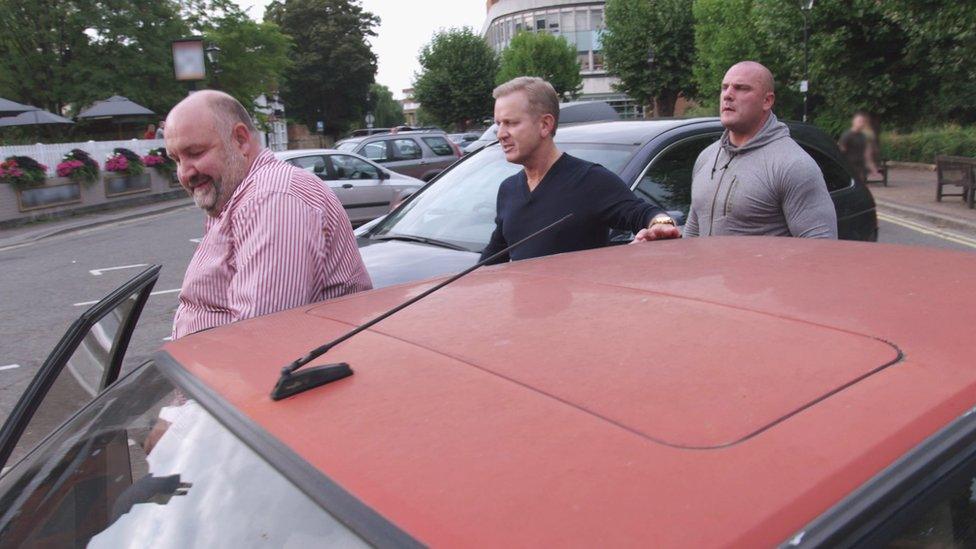 Jeremy Kyle getting out of a car