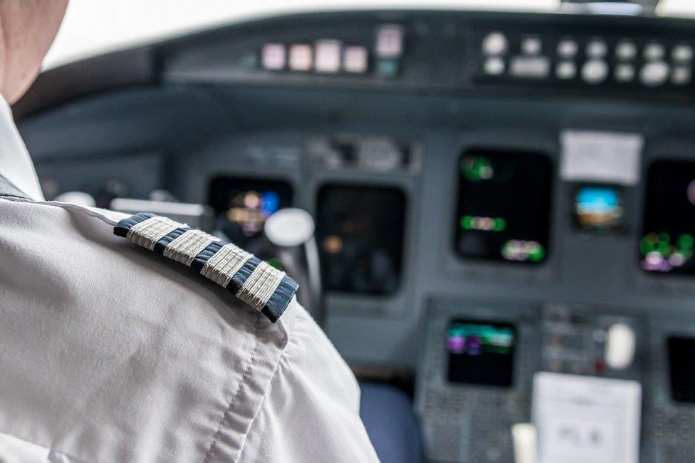 pilot in cockpit