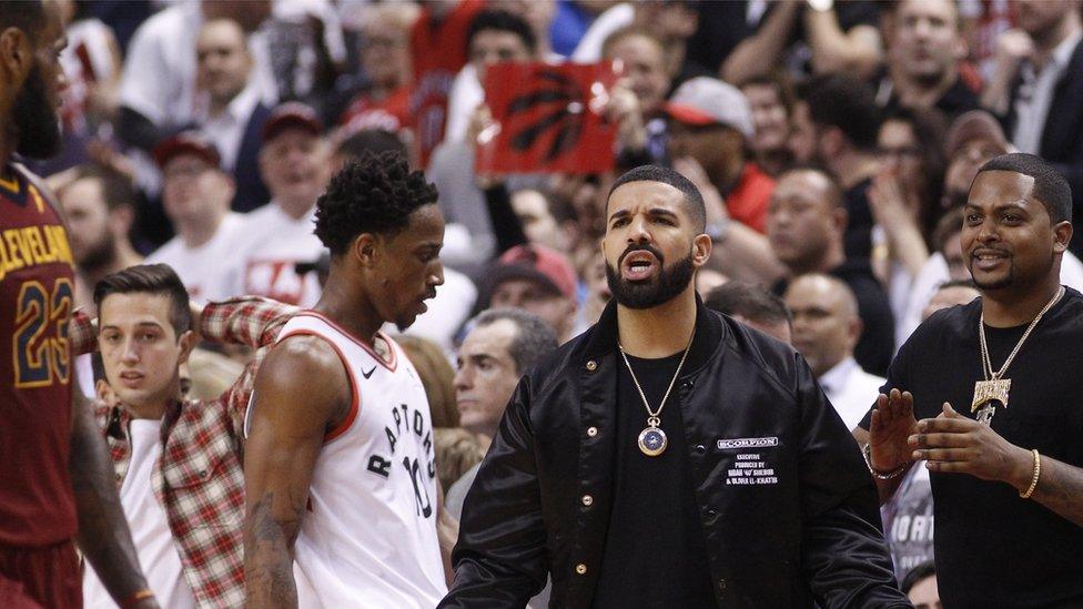 Drake at the first playoff match