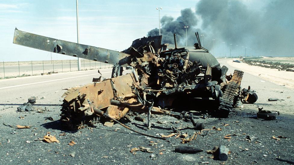 An Iraqi main battle tank on a highway south of Kuwait City destroyed in a Coalition attack during Operation Desert Storm - February 1991