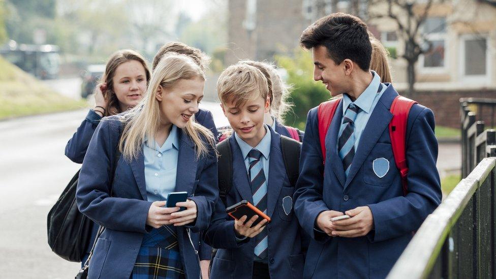 students walking and talking