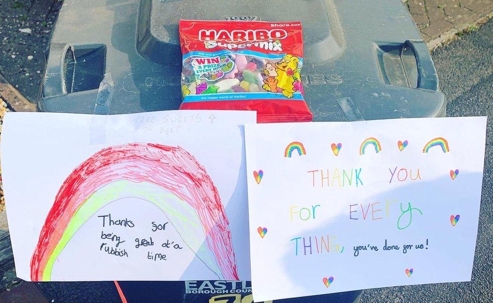 Thank you signs with rainbows and sweets attached to bins