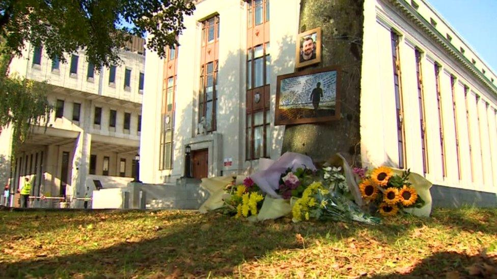 Flowers laid at the scene in memory of Ben and Dean