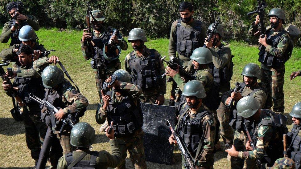 Pakistani army soldiers take part in a search operation at the Bacha Khan university following an attack by militants in Charsadda