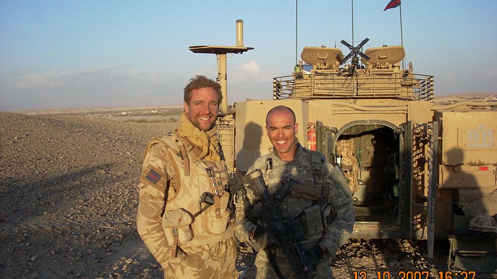 Nöel Lipana (right) beside a British Army officer in Afghanistan