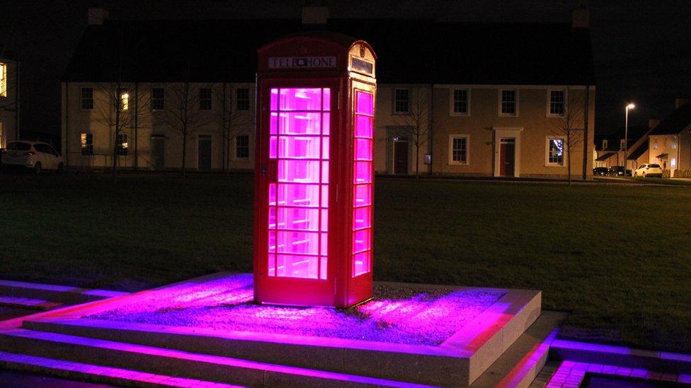 Lit telephone box in Chapelton by Lighting Design International