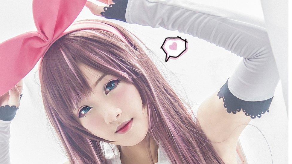 A cosplayer dressed as Kizuna AI