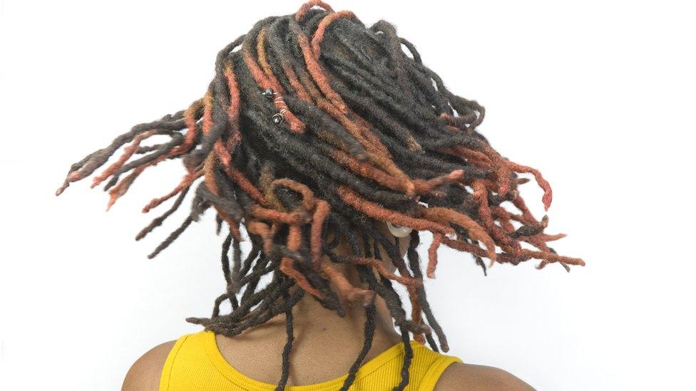 A woman with dreadlocks - generic shot