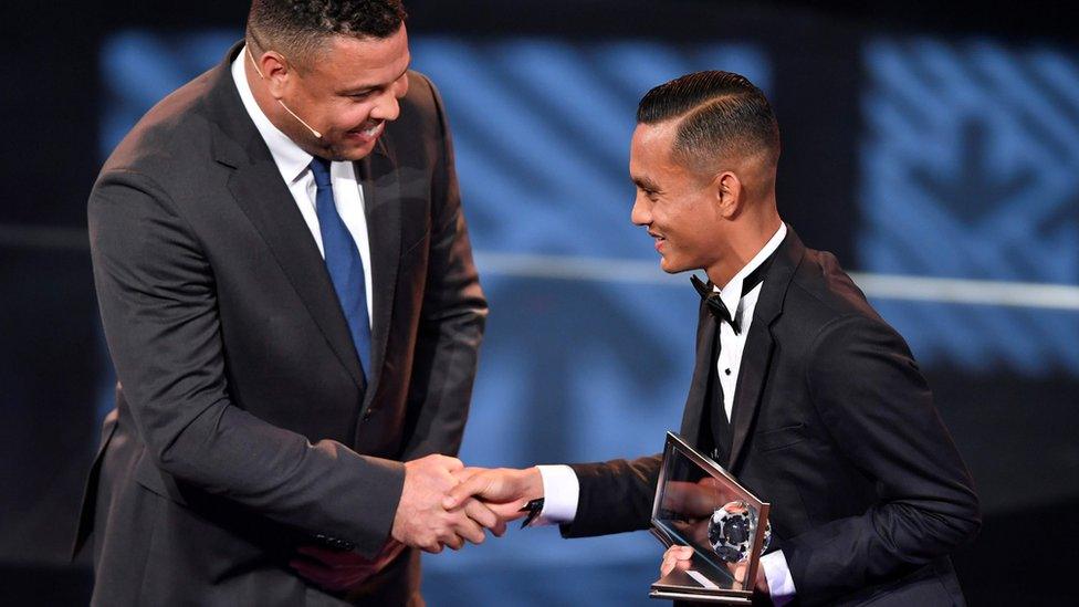 Mohd Faiz Subri is congratulated by Brazilian football legend Ronaldo