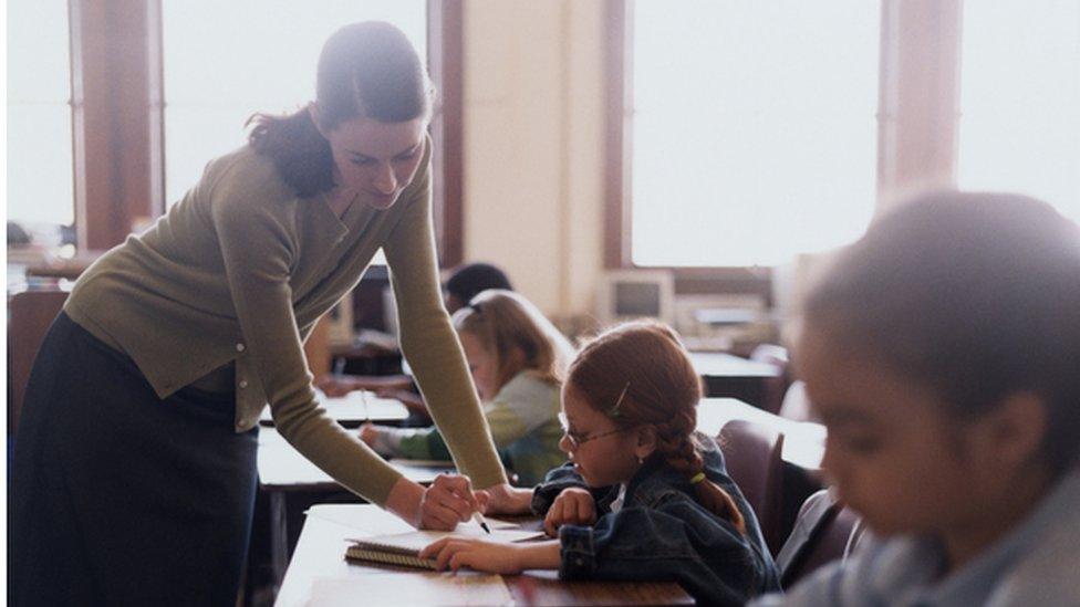 Teacher with pupils