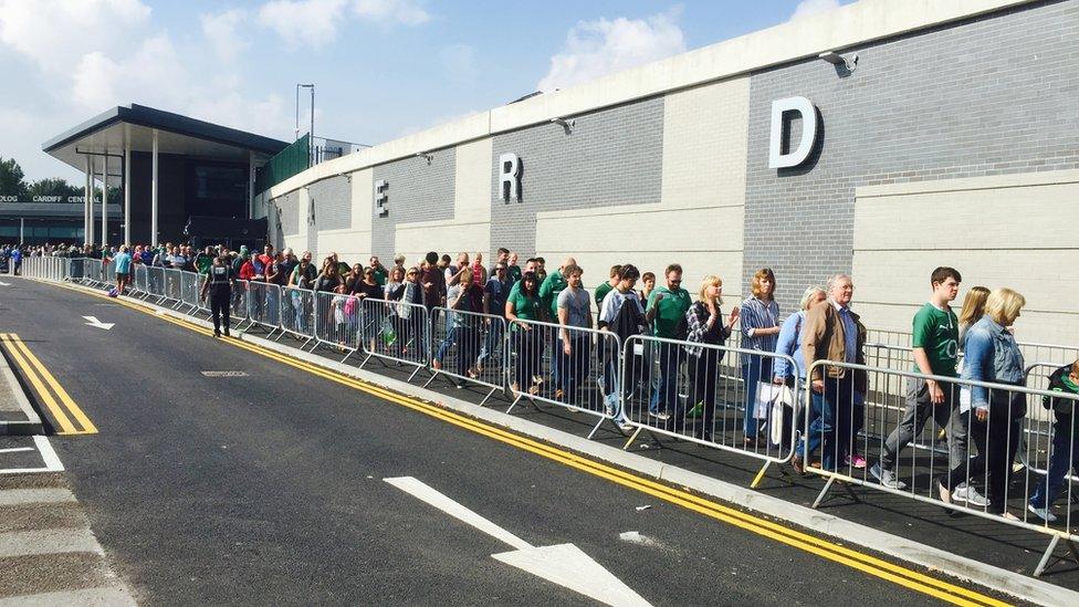 Fans exit Cardiff station