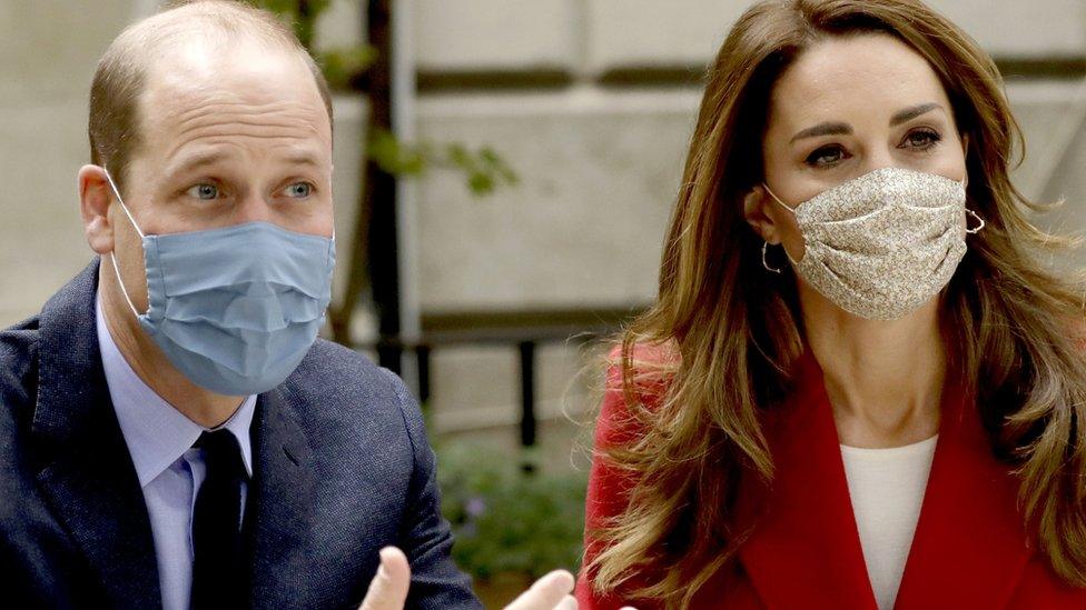 The Duke and Duchess of Cambridge talk with medical staff during a visit to St. Bartholomew"s Hospital in London, in October this year