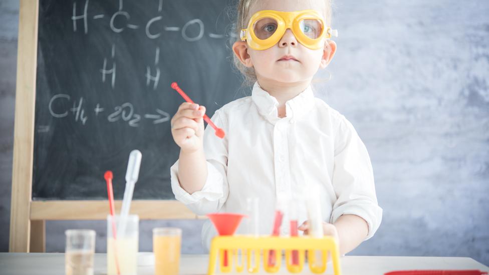 Child doing experiment