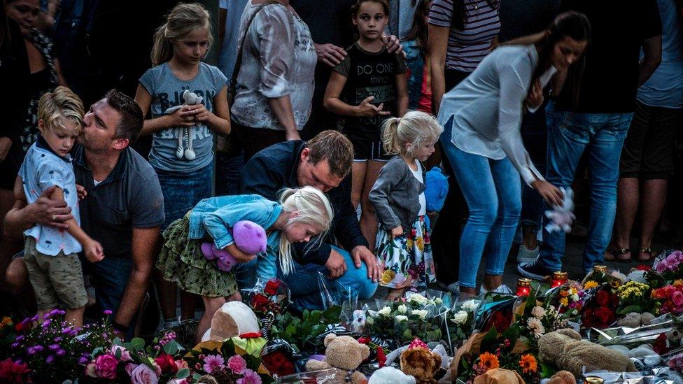 After the crash in Oss, local children came to leave flowers and teddy bears for the four who died (20 September)