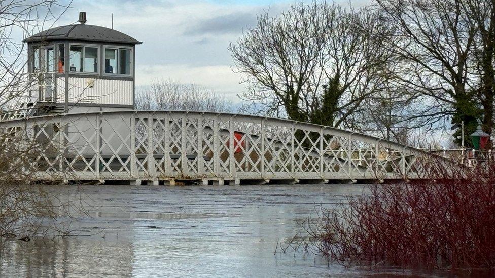 Cawood Bridge with water up to the base of the structure