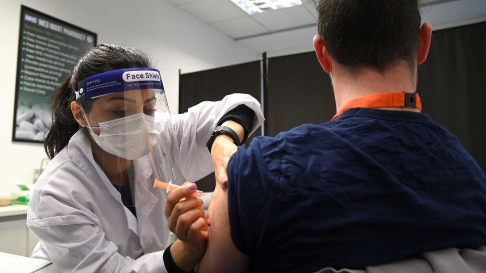 A care home worker in Borehamwood, Hertfordshire, being vaccinated