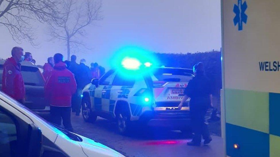 An ambulance on Skirrid Fach and rescuers