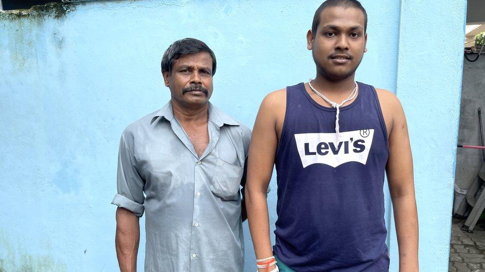 Upali Pushpakumara (left) with his son Nuwan