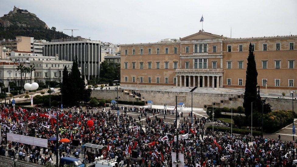 Members of the communist-affiliated PAME union take part in a rally in Athens.