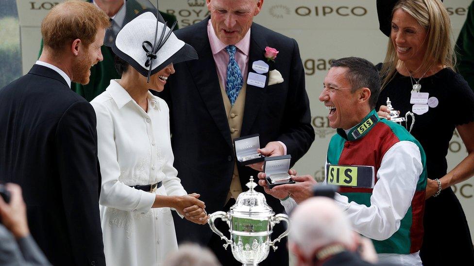 Frankie Dettori lifting trophy