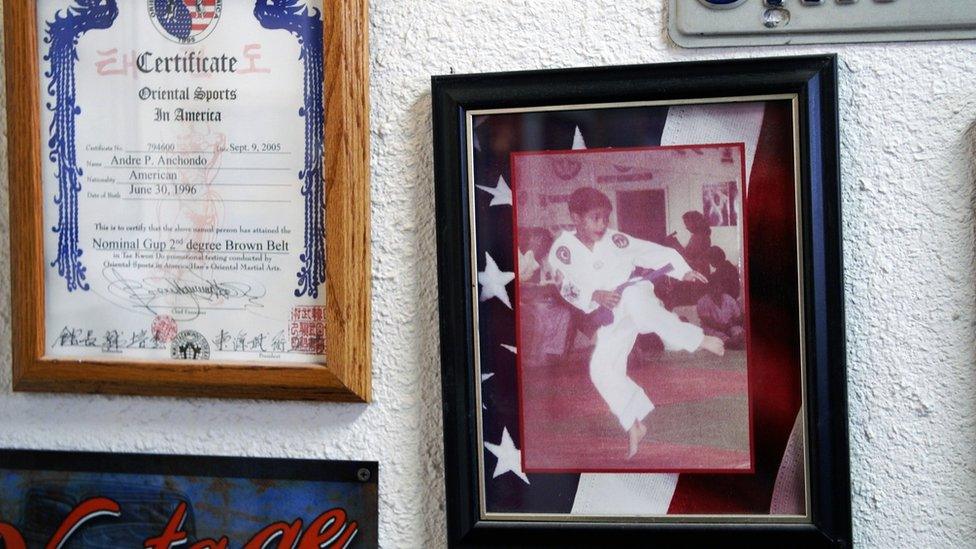 Pictures on the workshop wall of Andre as a young boy