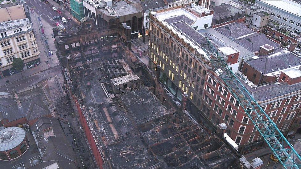 The fire-damaged top of the Bank Buildings as seen from above