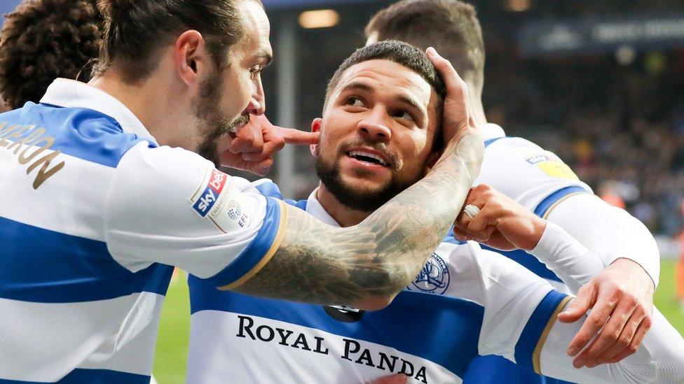 Nahki Wells is congratulated by QPR team-mates