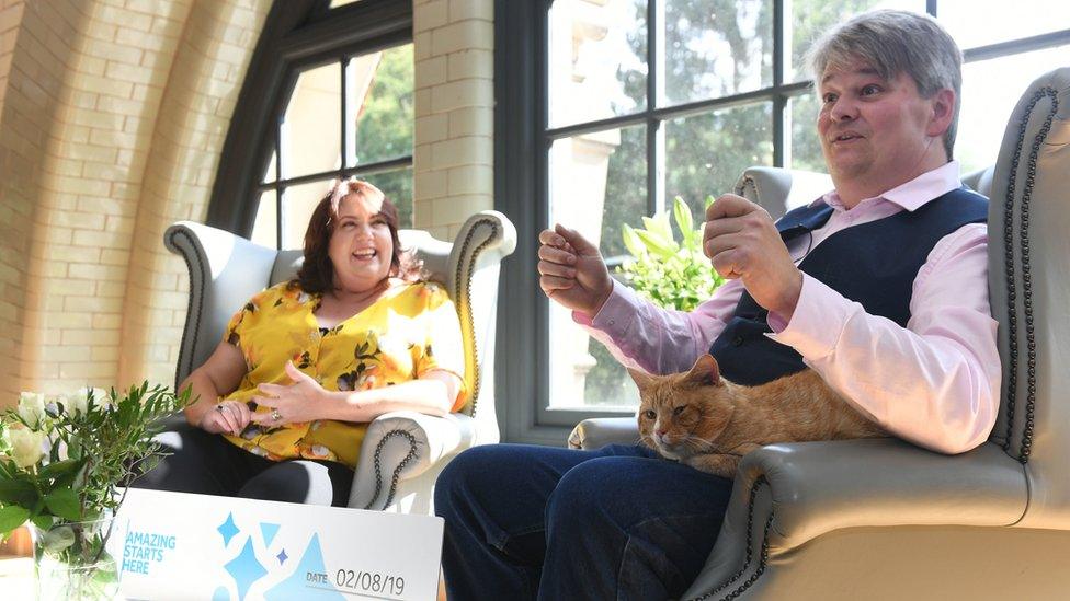 Andrew and Paula Hancock with Shortcake the cat at The Pumping House in Ollerton, Nottinghamshire