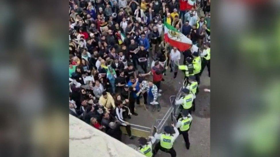 Protesters in front of the Iranian embassy in London