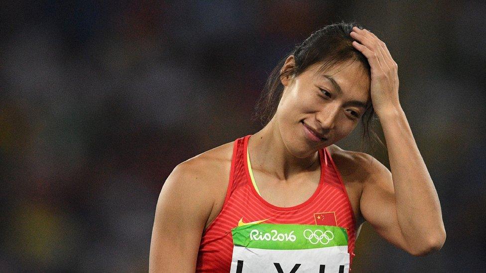 China's Lyu Huihui reacts in the women's javelin throw final