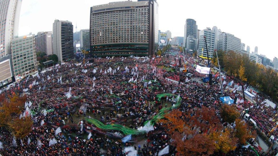 South Koreans protest against President Park Geun-Hye in Seoul on November 12, 2016.