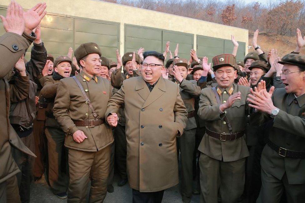 Picture of Kim Jong-un at a rocket engine test site in a photo released on 19 March 2017