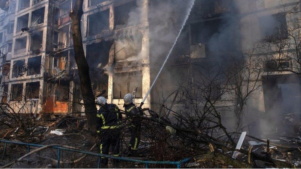 firefighters put out bomb fire in Ukraine