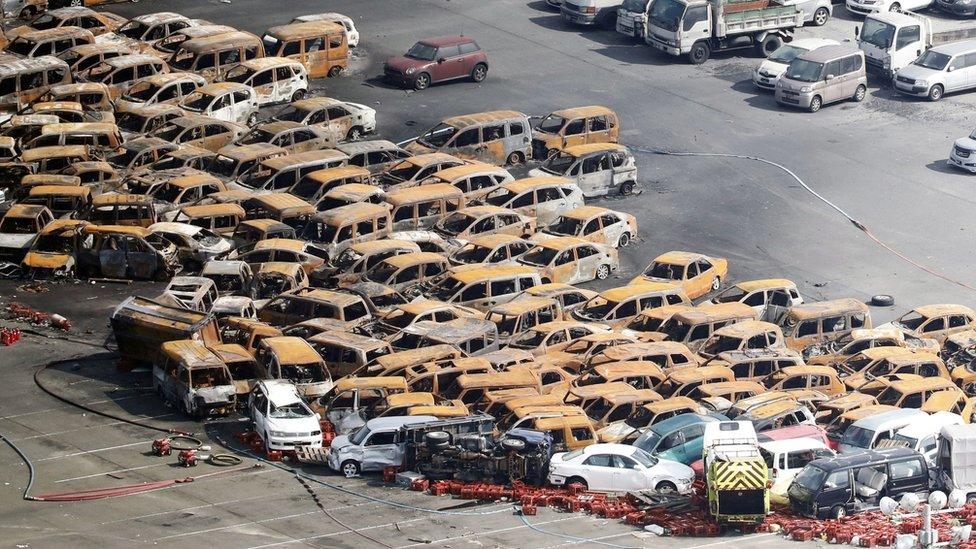 Burned cars in Nishinomiya, western Japan