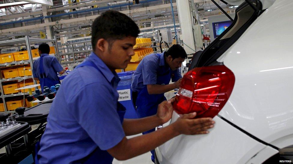 An employee at a Mercedes-Benz plant in India